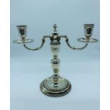 A Two prong silver candlestick, hallmarked