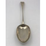 A silver serving spoon, hallmarked