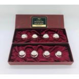 Two boxed sets of four silver plated name card holders