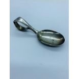 A silver baby spoon