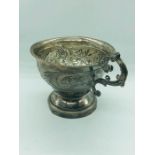 A silver Christening Cup.