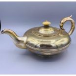 A silver teapot by Charles Gordon London 1833.