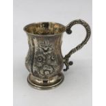 An Ornate silver tankard, hallmarked