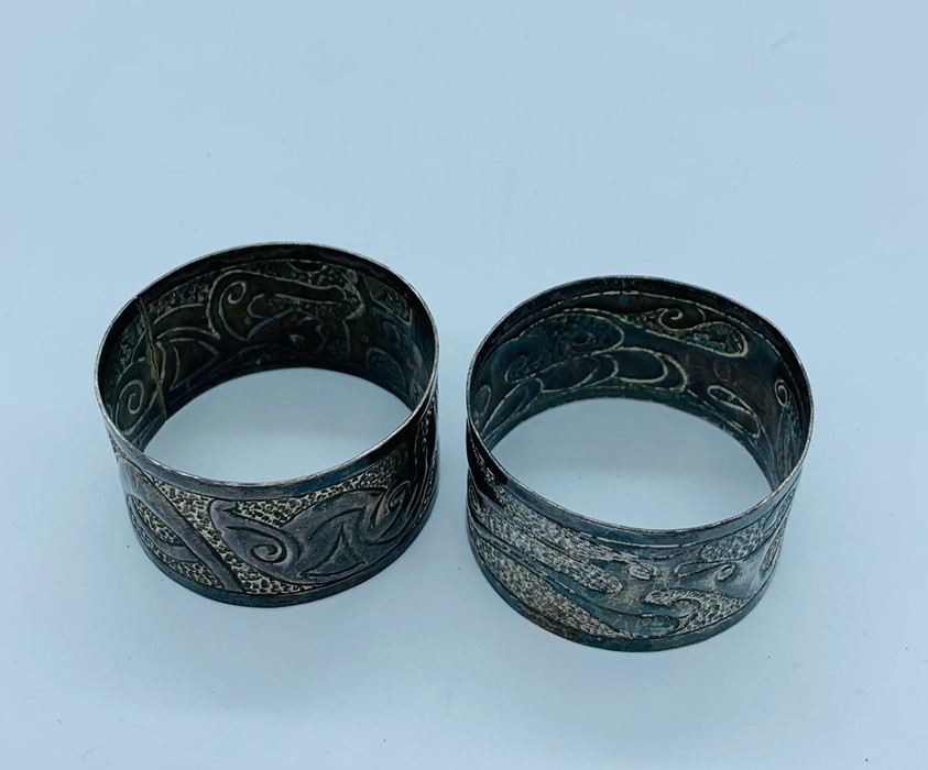 Two hallmarked silver napkin rings, Birmingham.