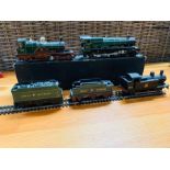 A Hornby engine, 4916 and two coal trucks along with " Lord of the Isles" 3046 Triang Engine