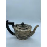 A silver teapot, hallmarked Birmingham 1907