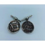 A Pair of silver masonic style cufflinks