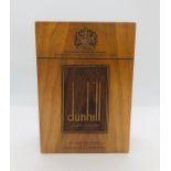 A Dunhill Advertising wooden block in the form of a packet of cigarettes.