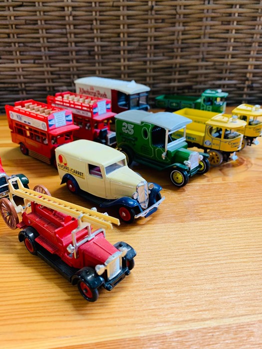 A Selection of Corgi, Matchbox and Commercial buses and trucks
