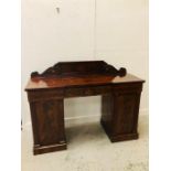 A Twin pedestal mahogany sideboard