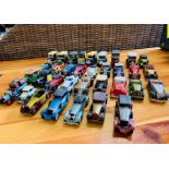 A Large selection of matchbox delivery vans and cars