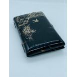 A Tortoiseshell Ladies card case with inlaid silver decoration with bird theme and ivory divider.