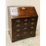 A Large bureau with four drawers and brass handles ( W92cm H110cm D56cm)