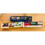 A selection of three box sets of diecast vehicles