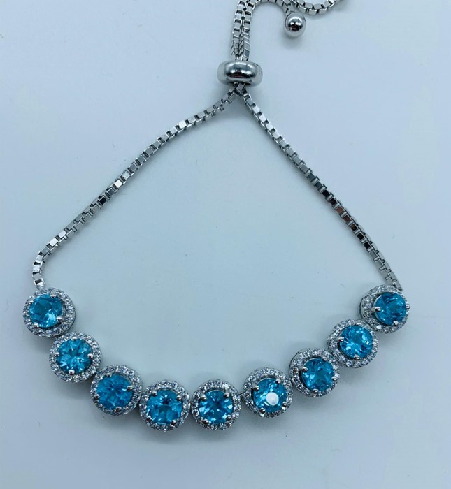 A Silver cz and blue topaz bracelet