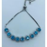 A Silver cz and blue topaz bracelet