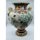 A Satsuma vase with Foo Dog decoration..