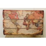 Map of the world on decorative wooden panel