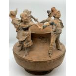 An 18th/19th Century bowl, decorated with dancing figures, probably Flemish.