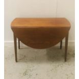 A Mid century drop leaf oak table by James Reeve Ltd