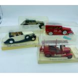 Four Solido boxed cars and trucks