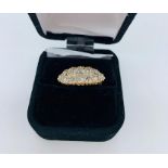 An 18ct yellow gold diamond ring in a marquise shape