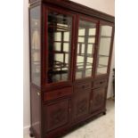 A Large display cabinet with three drawers and three cupboards underneath