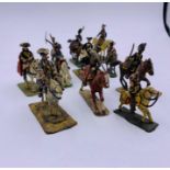 Eleven mounted Vintage lead mounted soldiers various regiments and periods