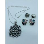 A small selection of silver and costume jewellery