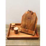 A Wooden tray, chopping board with two terracotta advertising pots