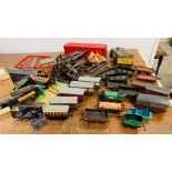 A Hornby Meccano 1940's Tin Train Railway to include fourteen open and closed wagons, five passenger