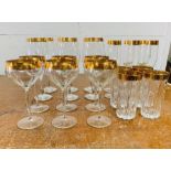 A selection of six wine glasses, six coupe glasses, six champagne glasses and four tumblers with