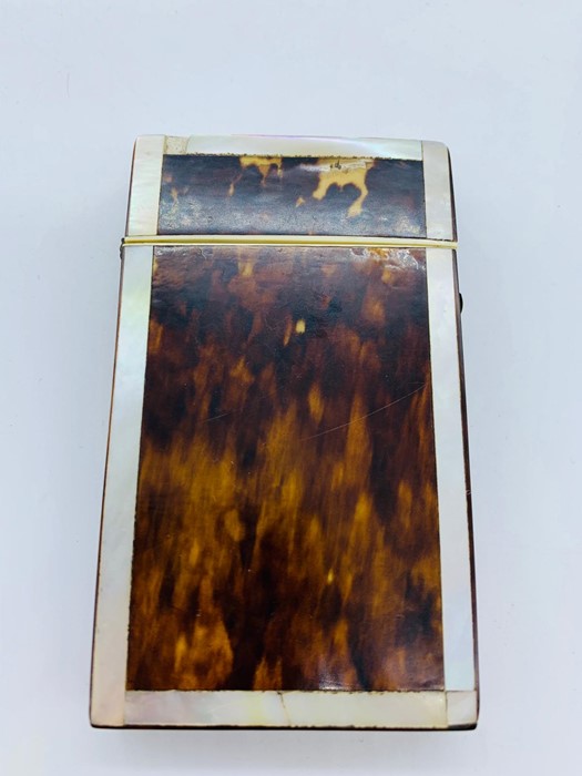 A Mother of Pearl and Tortoiseshell card case AF.