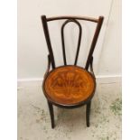 Wooden bistro chair with decoration to seat in art deco style