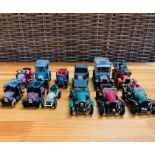 Twelve Corgi diecast cars