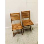 A Pair of folding wooden garden chairs AF