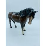 A Brown horse by Beswick.