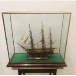 A Scratch built sailing ship in glass display case 1986