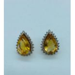 A pair of Citrine and diamond earrings