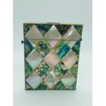 A Mother of Pearl card case.