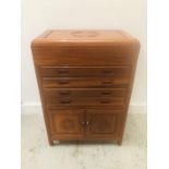 A Small Chinese cabinet with four slim drawers and a cupboard under ( H81cm D35cm W55cm)