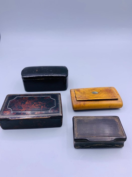 A selection of snuff boxes.