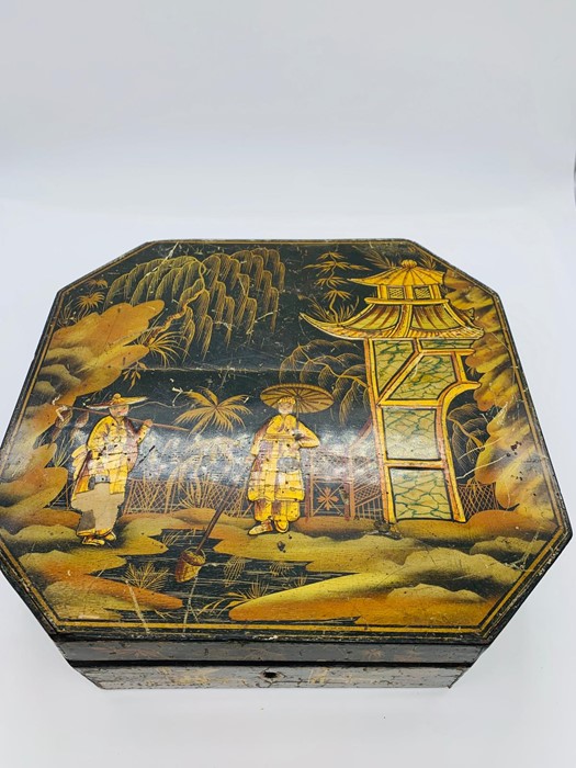 An Oriental work box containing a large number of Mother of Pearl gaming tokens.