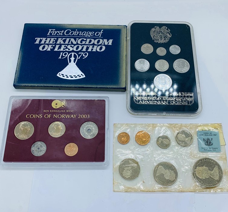 Four collectors coin packs 1994 Armenian coin set, 1967 coins of New Zealand, Coins of Norway 2003