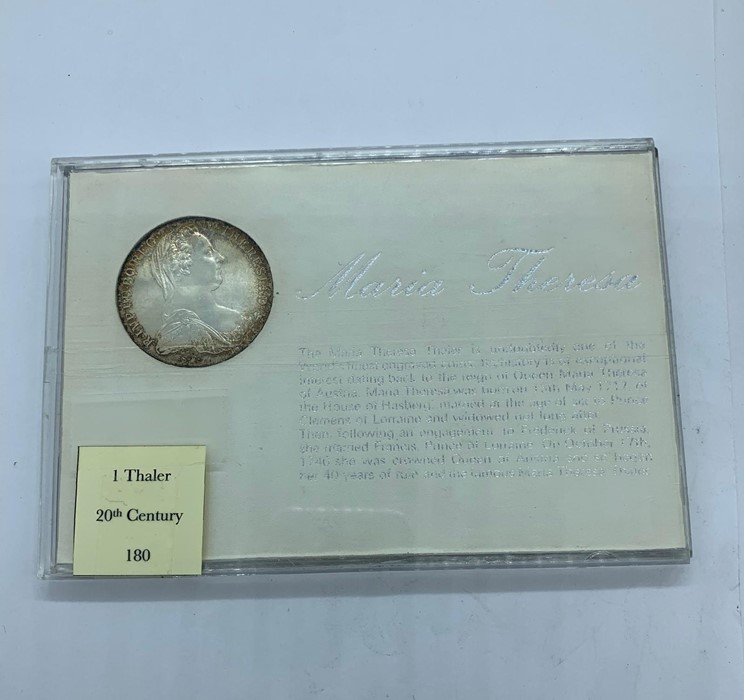 A presentation case 1 Maria Theresa 1 Thaler silver bullion coin.