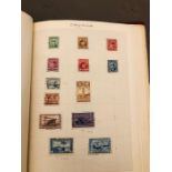 An album of stamps Canada, Ceylon Dominica, Cyprus and others.