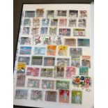 A worldwide album of stamps to include Helvetia, San Marino, Tadzikistan, Turkmenistan, Vatican,