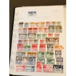 An Album of stamps to include Bermuda, Botswana, British Guiana, Virgin Islands, Burma, Canada.