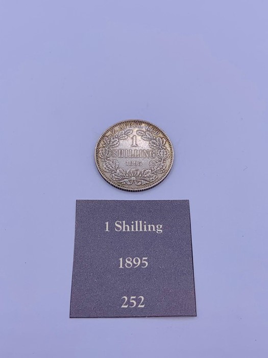 An 1895 silver 1 Shilling coin from South Africa AEF
