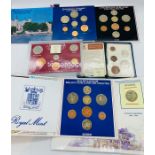 A selection of UK coin packs to include: 1983 UK Uncirculated Coin Pack, 1984 UK Brilliant
